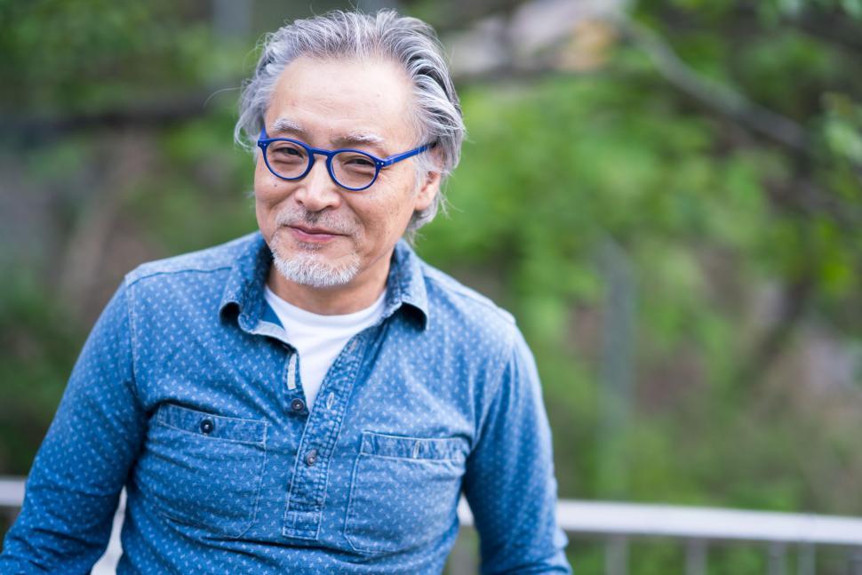 Free Image of Older Man With Glasses and Blue Shirt 