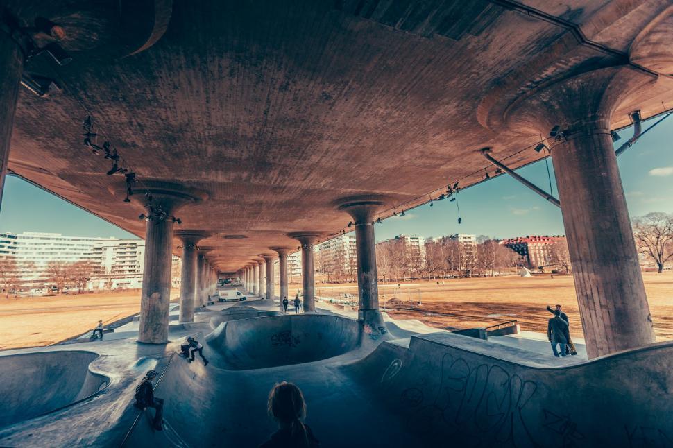 Free Image of Skateboard Park With People Skateboarding on Ramps 