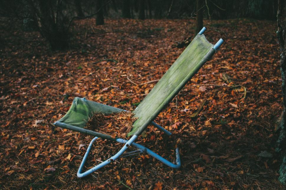 Free Image of Green Lawn Chair in Forest Setting 