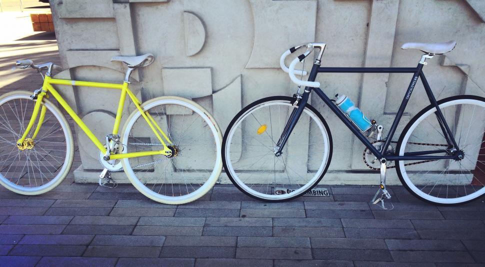 Free Image of Two Parked Bicycles Standing Together 