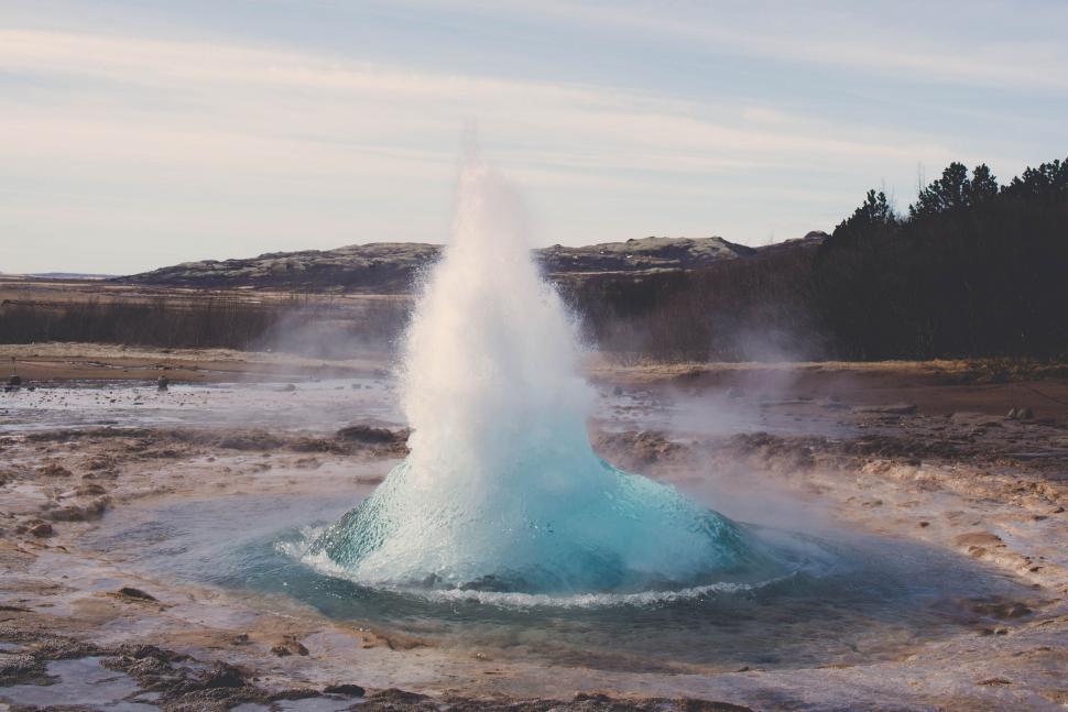 Free Image of Geyser Spewing Water Into the Ground 