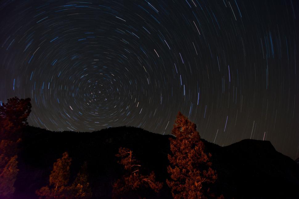 Free Image of Night Sky Revealing Star Trail Movement 