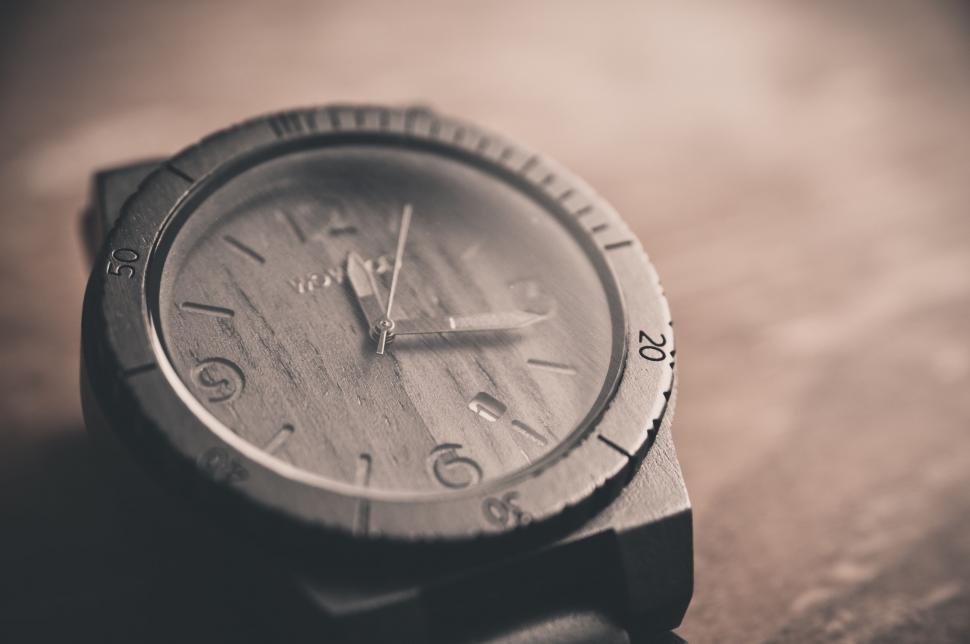 Free Image of Watch on Wooden Table 