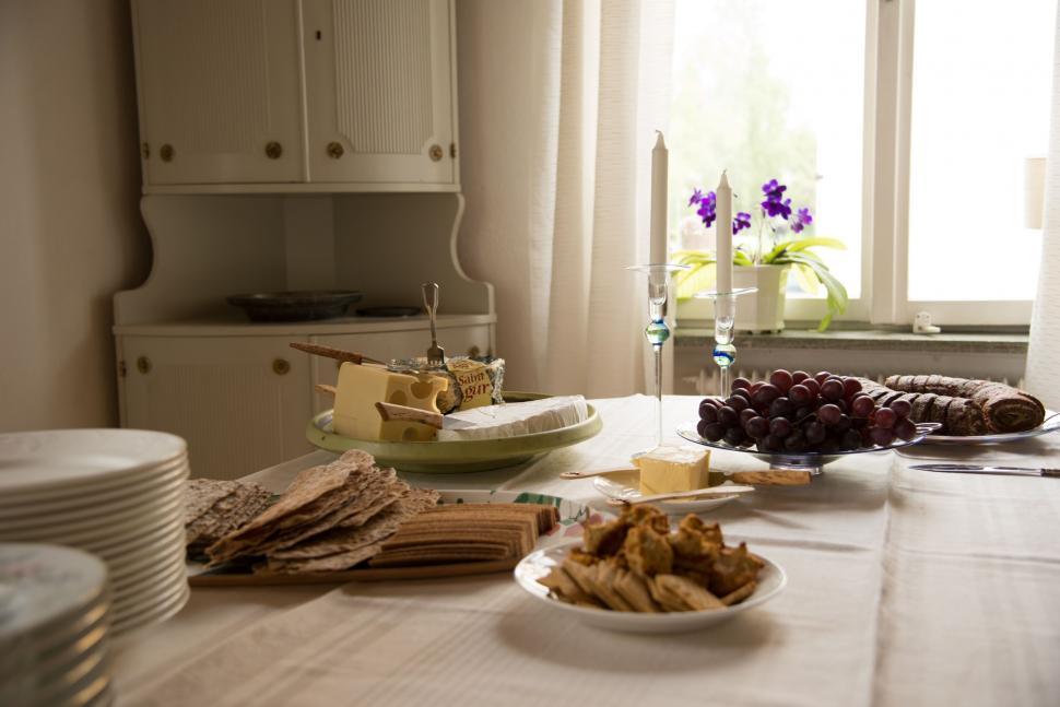 Free Image of White Table Set With Plates of Food 