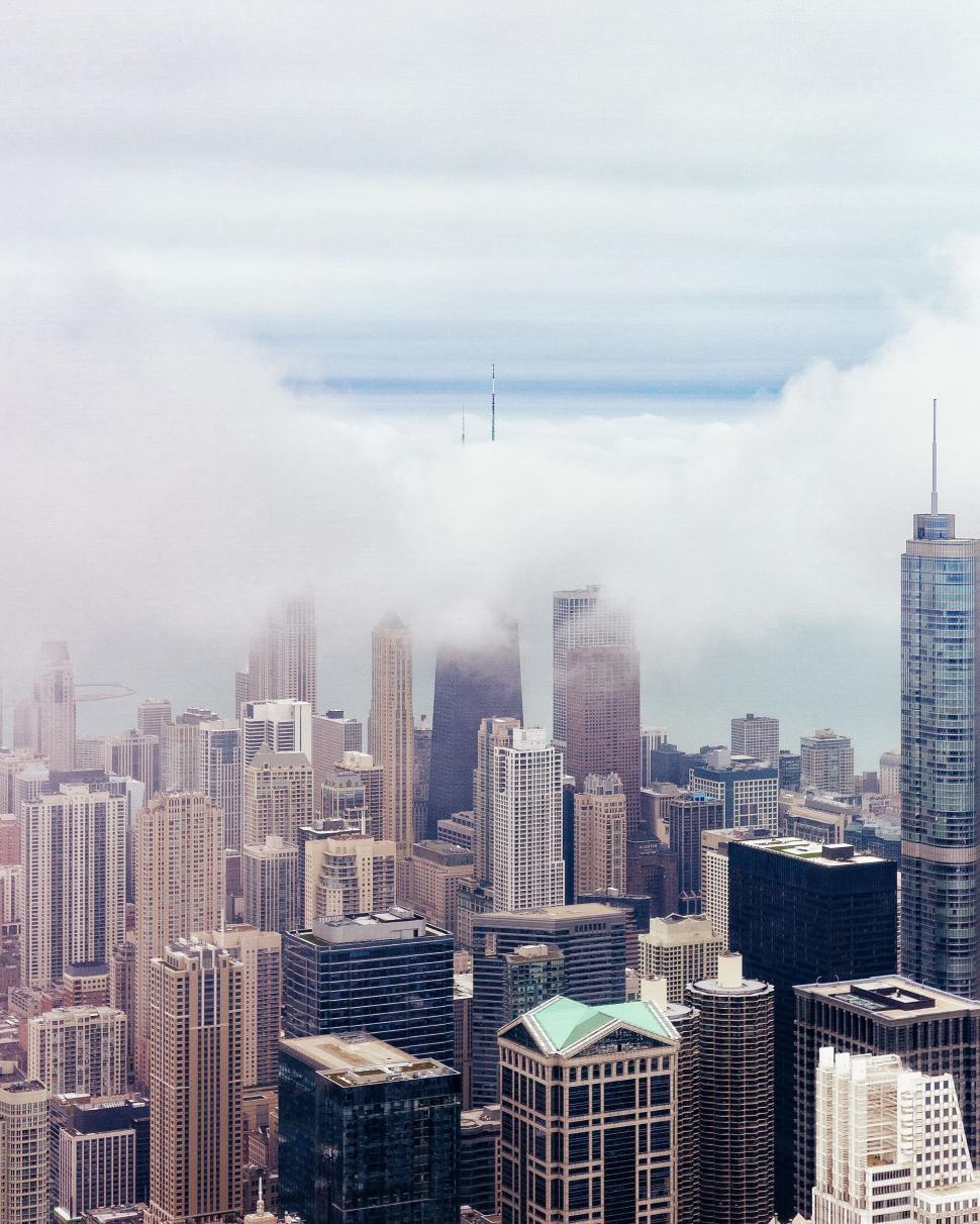 Free Image of Urban Landscape With Skyscrapers and Clouds 