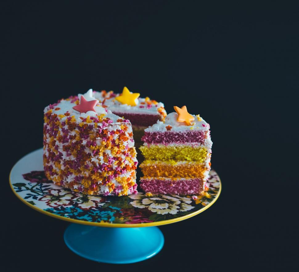 Free Image of Slice of Cake on Plate With Sprinkles 