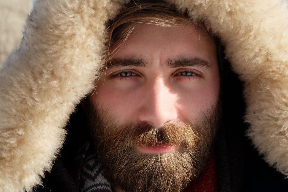 Free Image of Man With Beard Wearing Fur Coat 