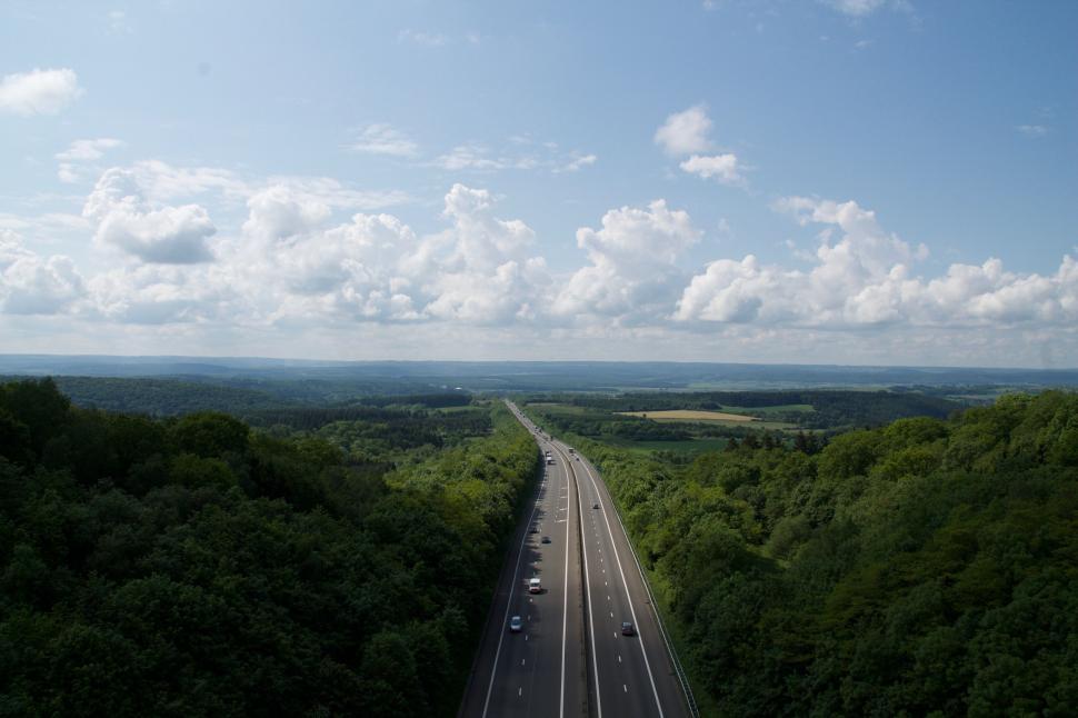 Free Image of Aerial View of Highway Surrounded by Trees 