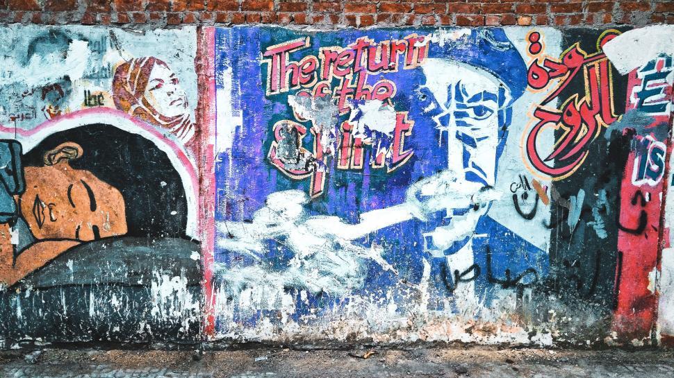 Free Image of Graffiti-Covered Brick Wall 
