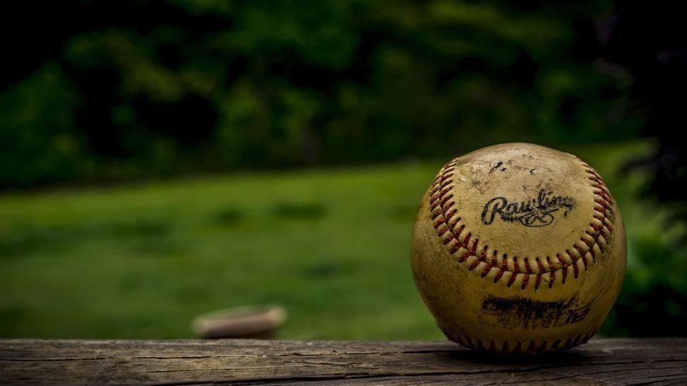 Free Image of Baseball on Wooden Table 