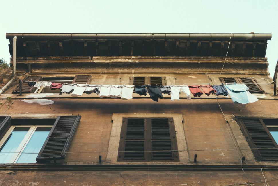 Free Image of Clothes Hanging Out to Dry on a Clothesline 
