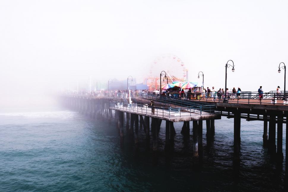 Free Image of Foggy Day Pier With People 