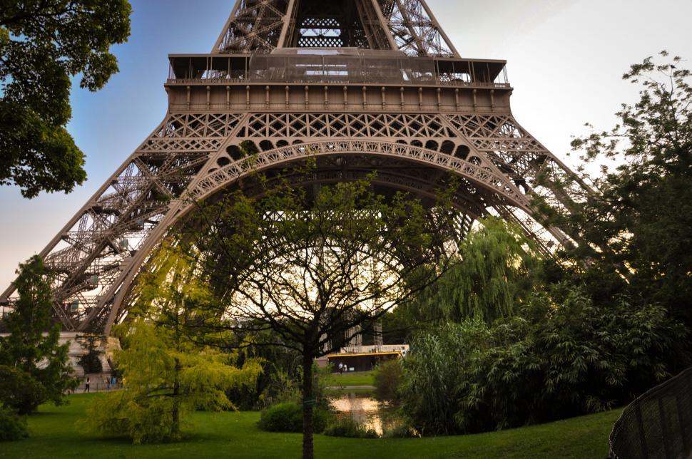 Free Image of The Eiffel Tower Dominating a Green Park 