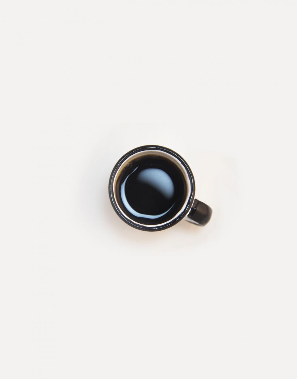 Free Image of A Cup of Coffee on a White Table 