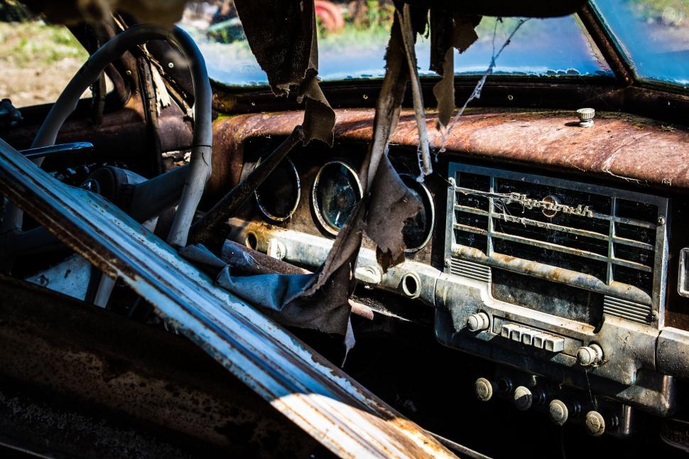 Free Image of Rusty Old Car With Steering Wheel and Dashboard 