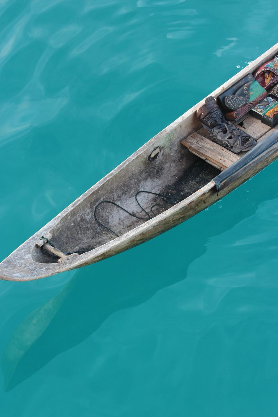 Free Image of Small Boat Floating on a Body of Water 