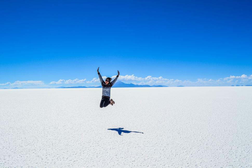 Free Image of Person Jumping in the Air in Desert 