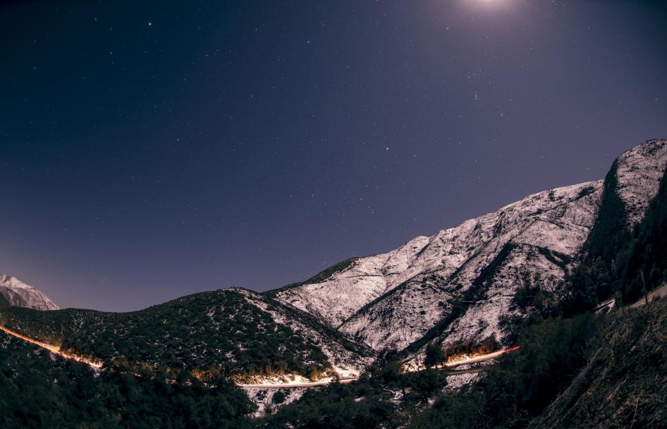Free Image of Majestic Mountain Landscape With Starlit Sky 