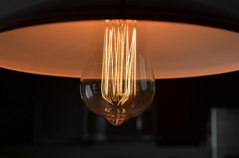Free Image of Close Up of a Light Bulb on a Ceiling 