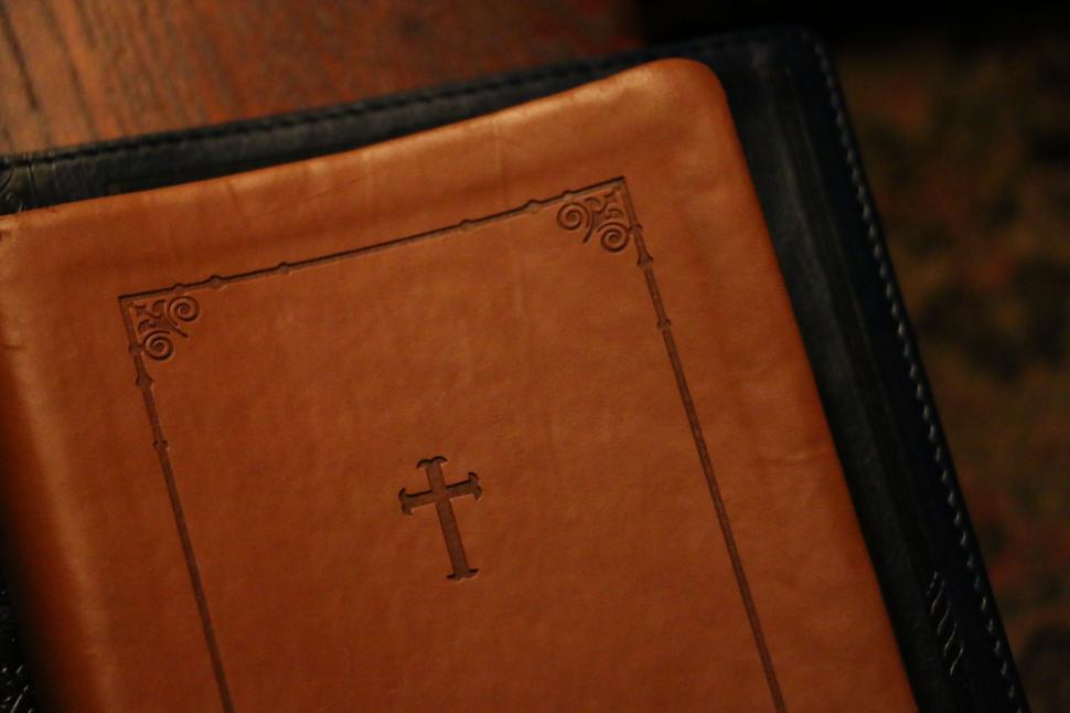 Free Image of Brown Book With Cross 