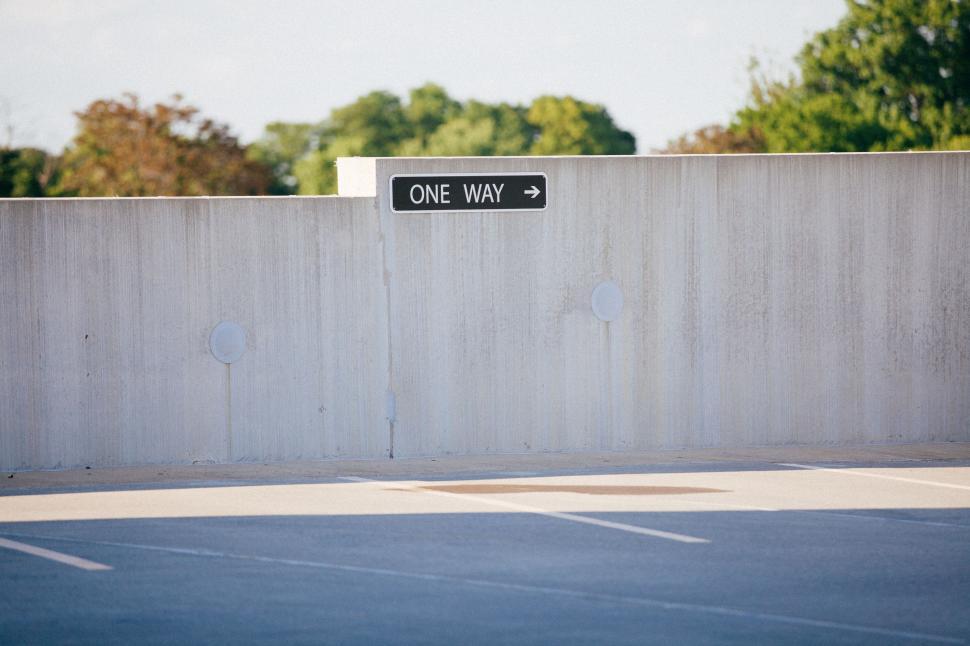 Free Image of One Way Sign on the Wall 
