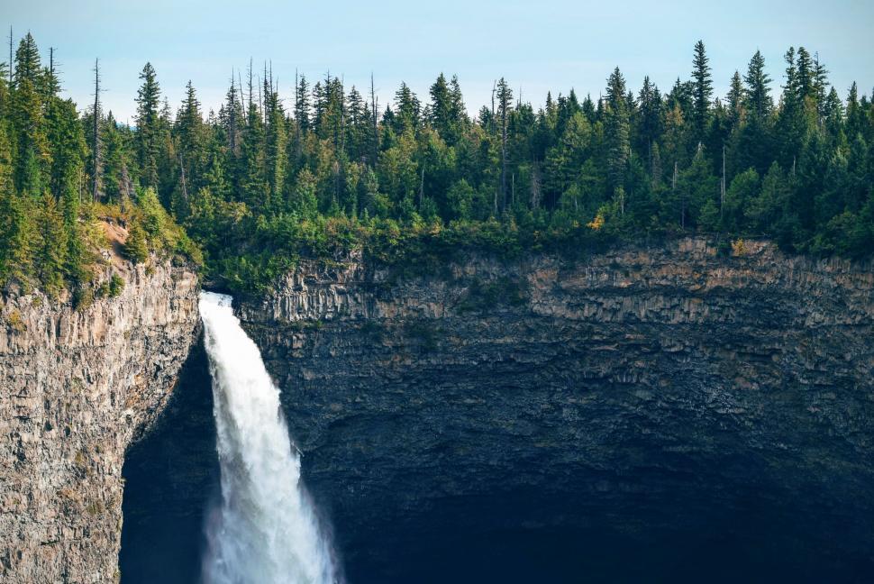 Free Image of Waterfall Viewed From Boat on Water 