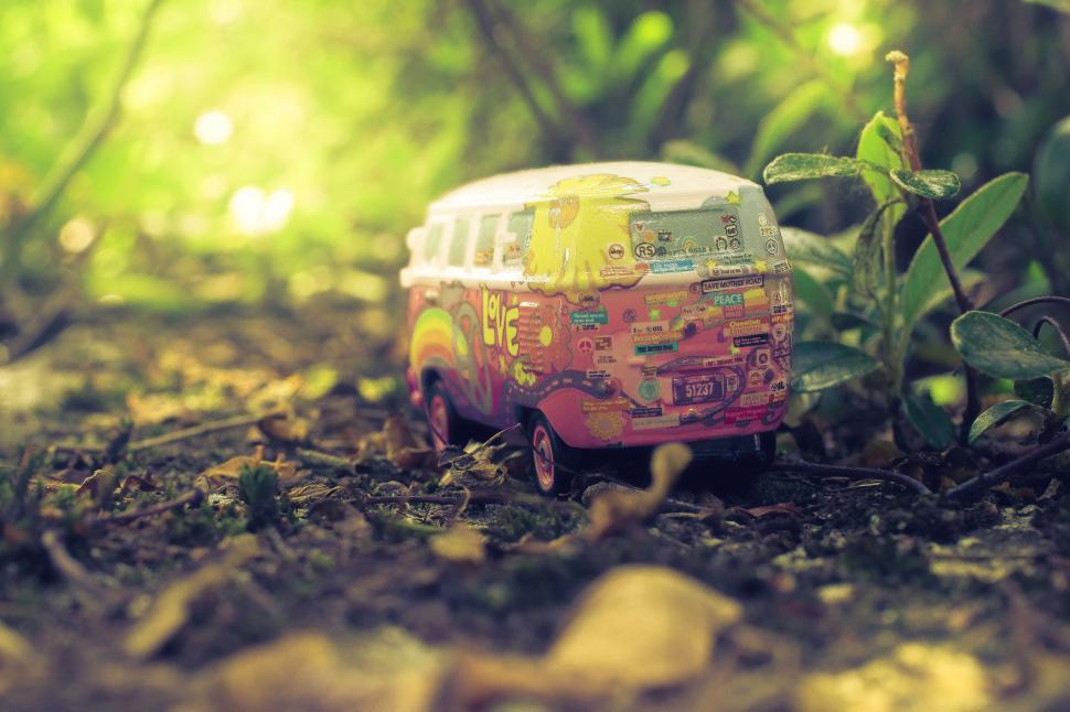 Free Image of Toy Bus Abandoned in Forest 
