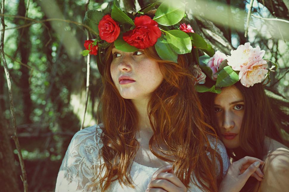 Free Image of Two Women Wearing Flower Crowns 