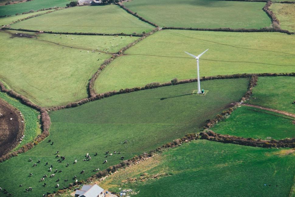 Free Image of Aerial View of a Farm With Wind Turbine 