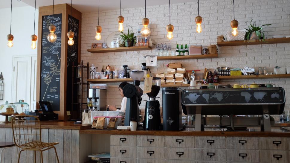 Free Image of Coffee Shop With Lots of Hanging Lights 
