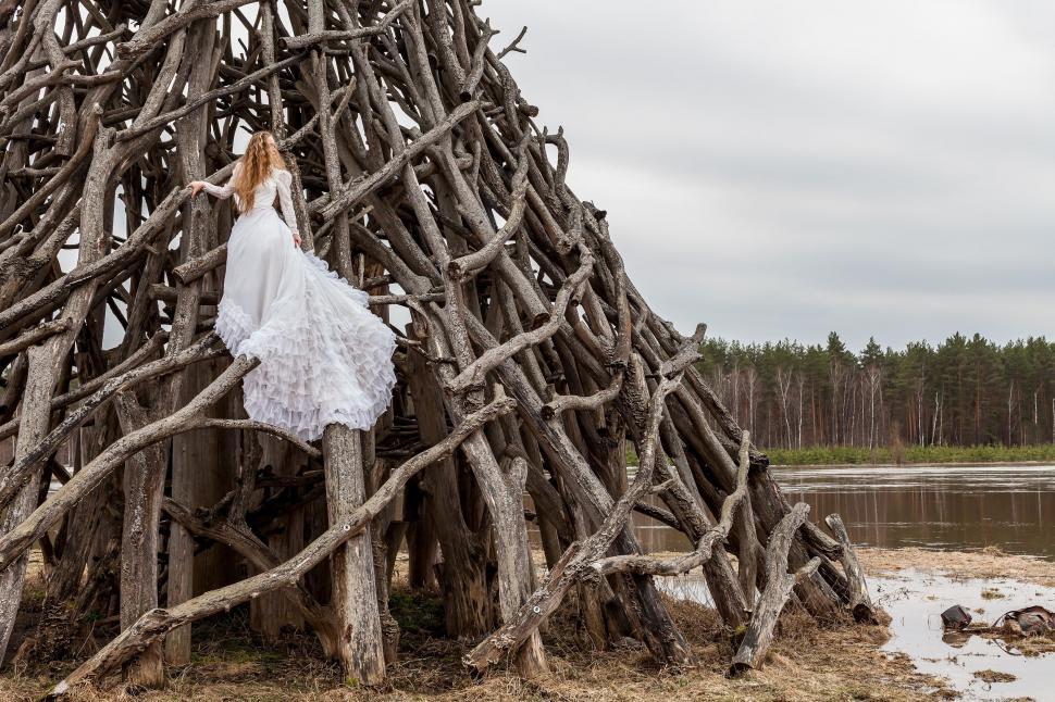 Free Image of Wooden Structure With Hanging Clothes 