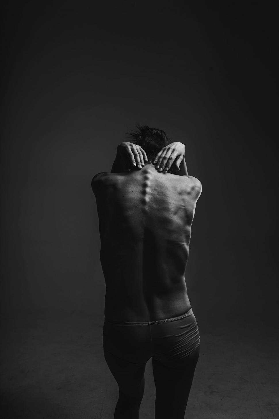 Free Image of Naked Man Standing in Black and White 