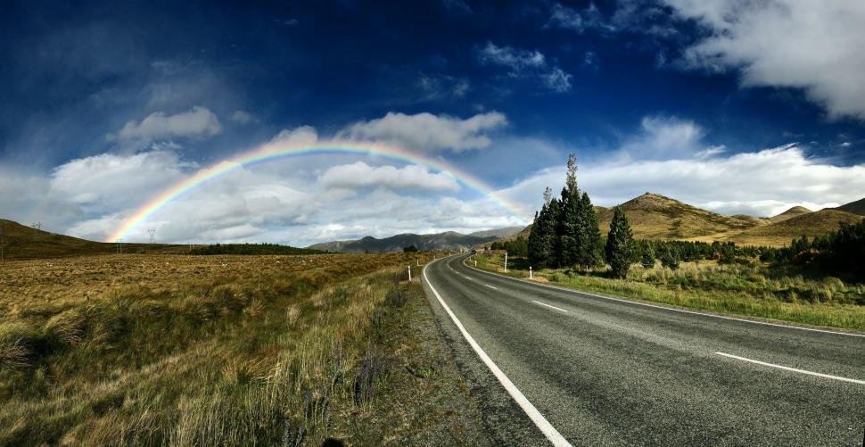 Free Image of Long Road With Rainbow in the Sky 