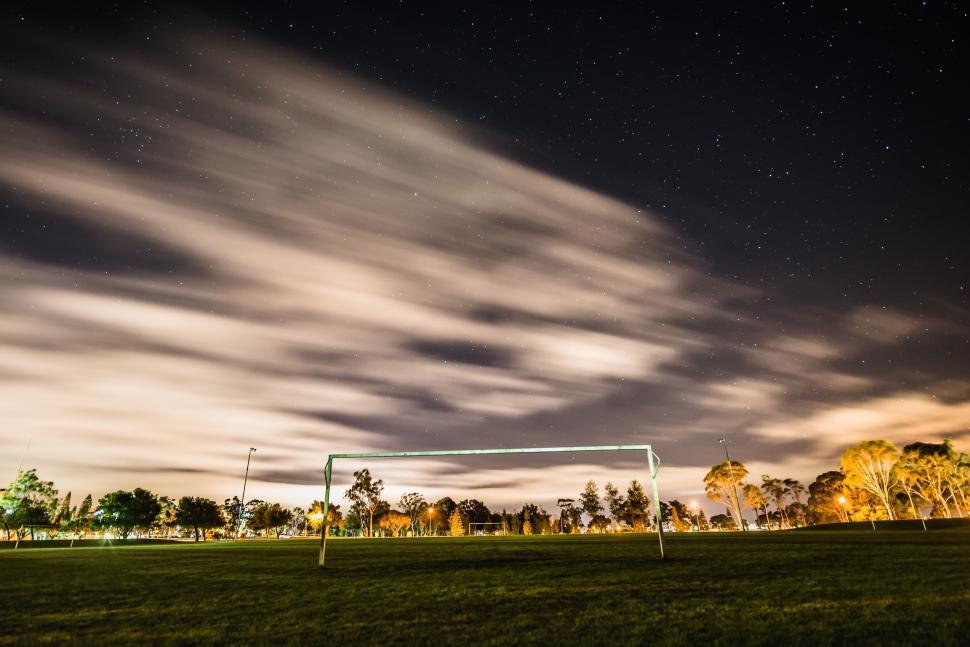 Free Image of Soccer Goal in Field Under Night Sky 