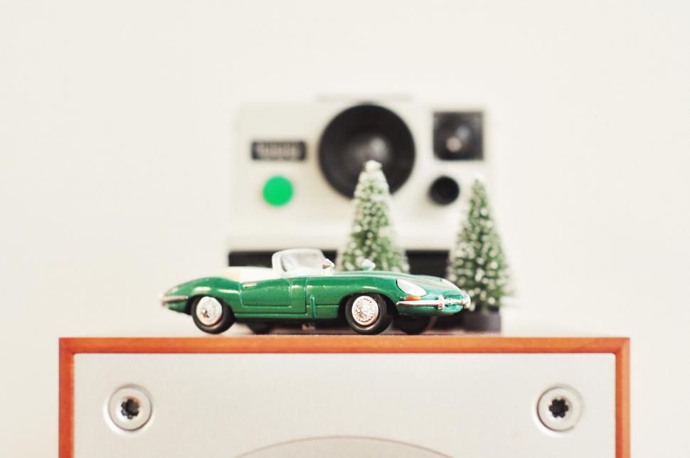 Free Image of Toy Car on Top of Stereo 