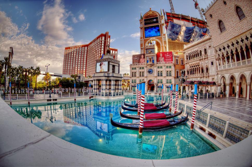 Free Image of Gondola Floating in City Pool 