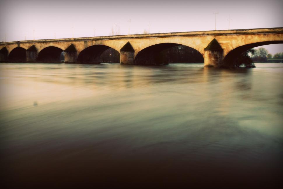 Free Image of Large Bridge Spanning Across Vast Body of Water 