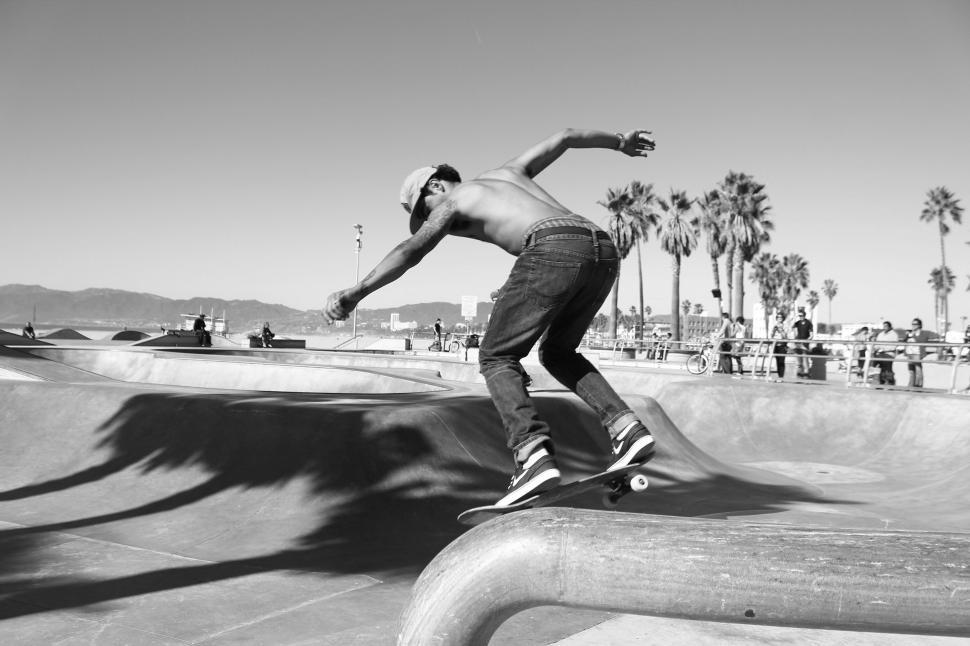 Free Image of Man Riding Skateboard Up Ramp 
