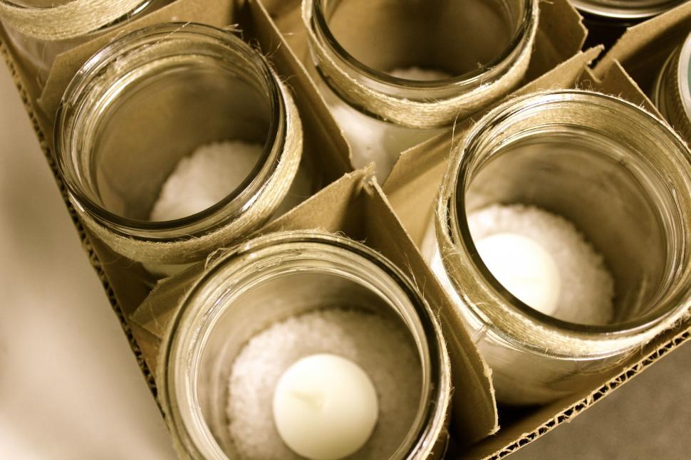 Free Image of Box Filled With Empty Jars 