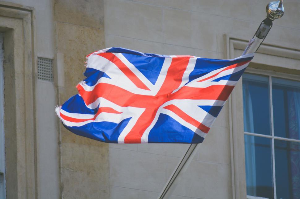 Free Image of British Flag Flying in Front of Building 