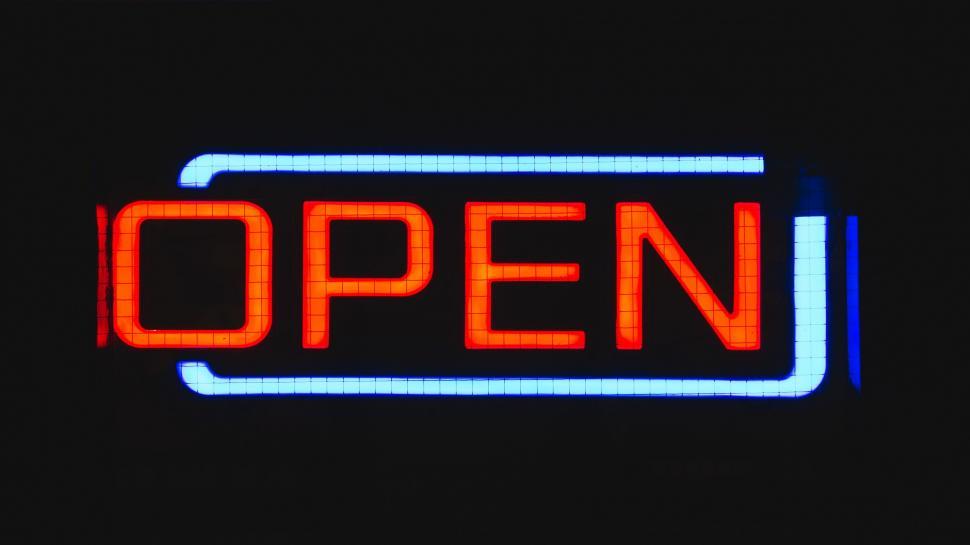 Free Image of Bright Open Sign Illuminated in Darkness 
