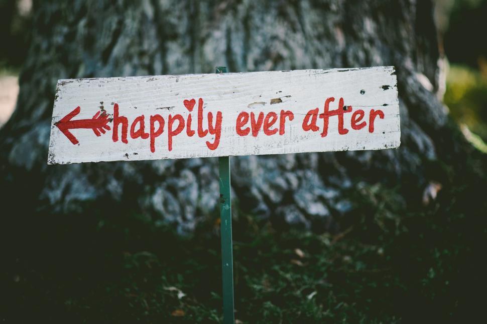 Free Image of Happily Ever After Sign in Front of Tree 