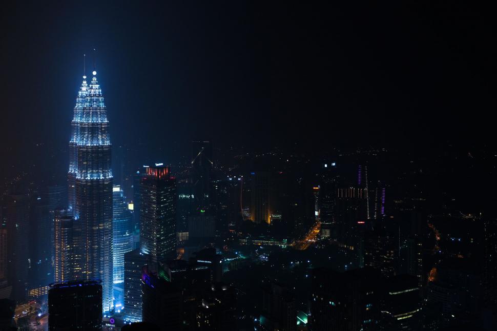 Free Image of Towering Skyscraper Illuminated at Night 