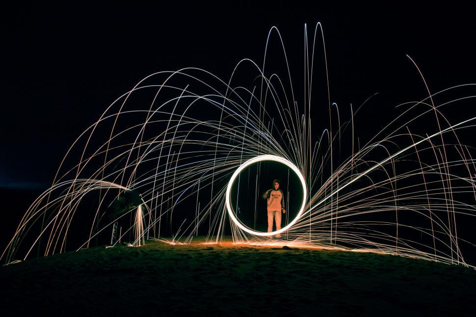 Free Image of Person Standing in Circle of Light 