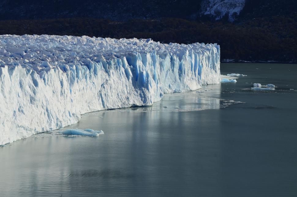 Free Image of Massive Glacier Wall With Ice on Water 