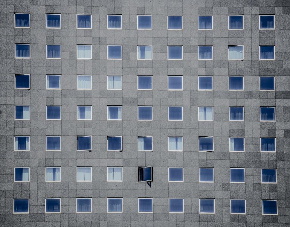 Free Image of Tall Building With Numerous Windows 