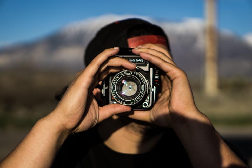 Free Image of Person Holding Camera Up to Their Face 
