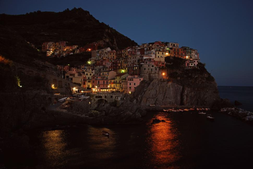 Free Image of Night View of a Cliffside Village 