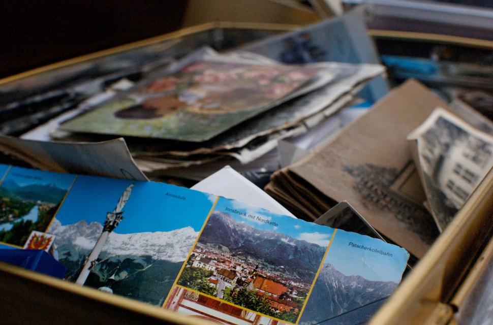 Free Image of Wooden Box Filled With Old Photos 