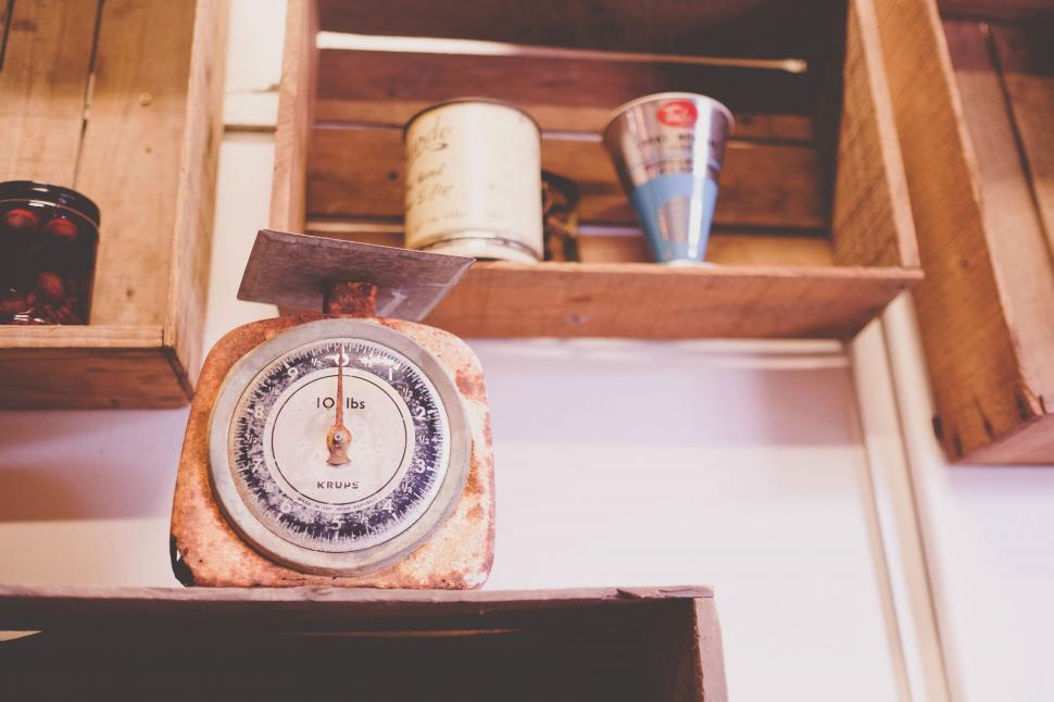 Free Image of Kitchen Scale on Wooden Shelf 